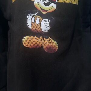 Black Sweatshirt with Cartoon Character and Patterned Design never worn